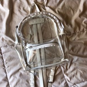 clear backpack with white detailing